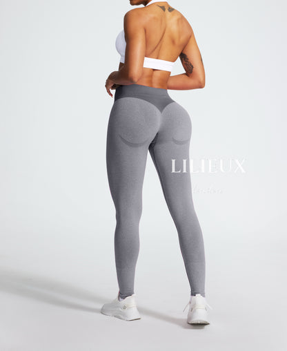 Back view of high-waisted grey seamless leggings with butt-lifting contour design, ideal for gym, yoga, and fitness wear.