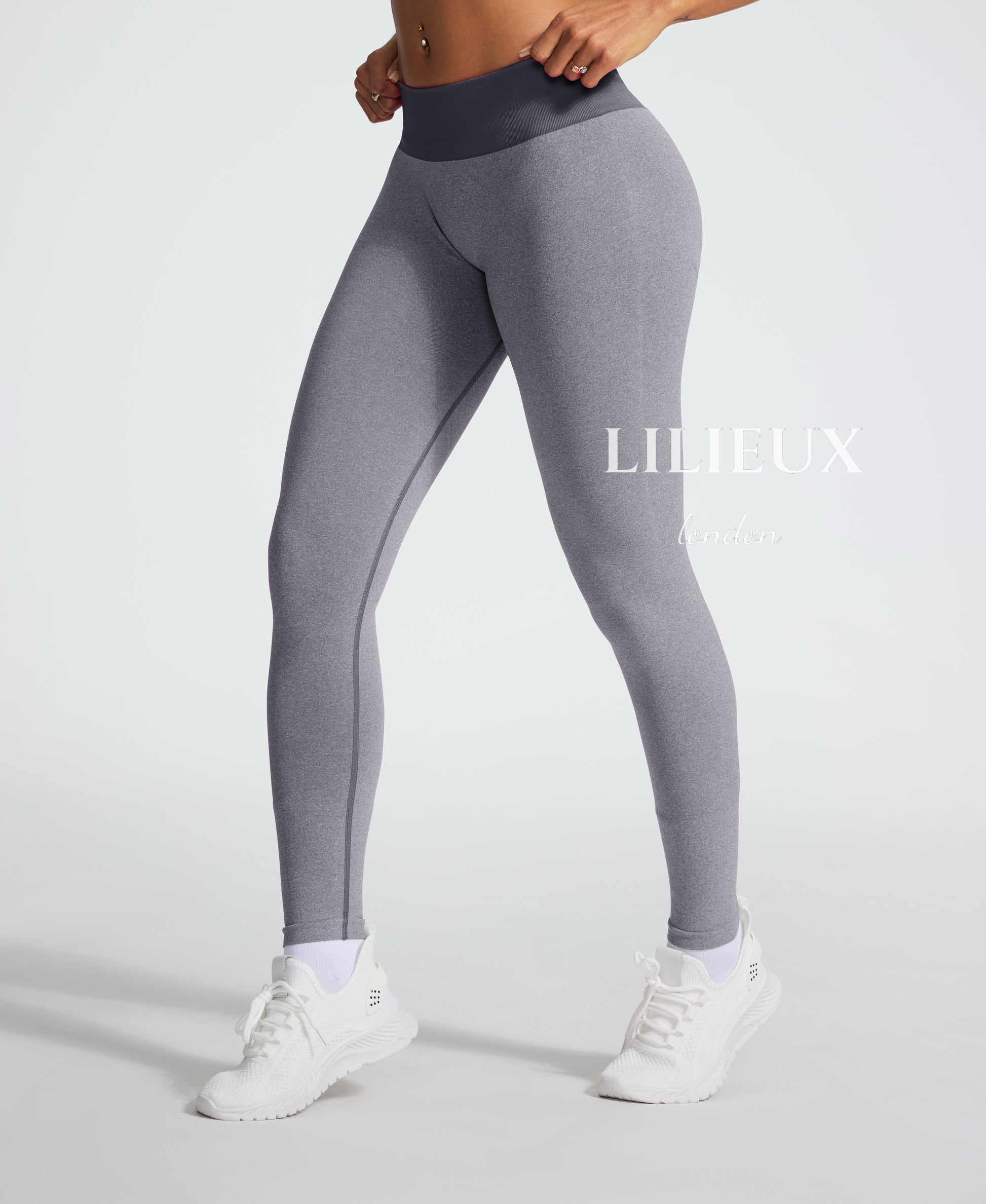 High-waisted grey seamless gym leggings for women, designed for comfort, flexibility, and performance during workouts.