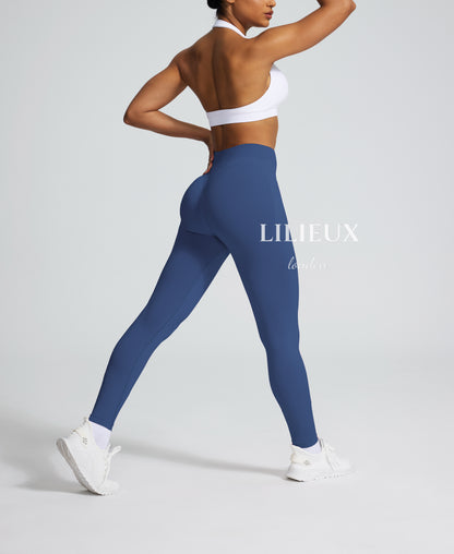 Form-fitting blue leggings with a high waistband and sculpting design, ideal for fitness, yoga, and casual activewear styling.